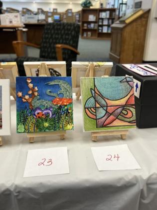 The Friends of the Library is hosting its Tiny Art! Big Fun! Art Contest, featuring more than 40 miniature works created by local artists. The exhibition is currently on display at the library and invites visitors to vote for their favorite pieces through June 26. Photo by Amy Mulligan/News-Leader