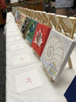 The Friends of the Library is hosting its Tiny Art! Big Fun! Art Contest, featuring more than 40 miniature works created by local artists. The exhibition is currently on display at the library and invites visitors to vote for their favorite pieces through June 26. Photo by Amy Mulligan/News-Leader