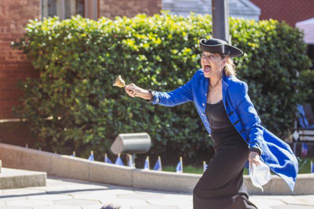 Alexandra LaJoux performs as the town crier ahead of the reading of the Declaration of Independence in downtown Fernandina Beach. Photo by Ashley Chandler/News-Leader