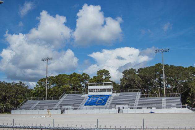Construction of the Fernandina Beach High School stadium is nearing completion. Work continued Tuesday on the track, field and concession stand. Photo by Ashley Chandler/News-Leader