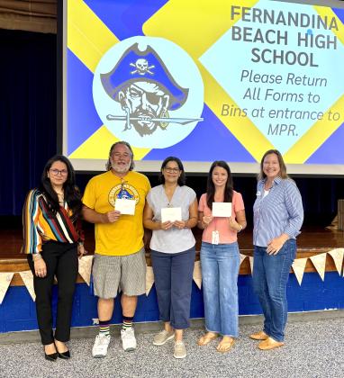 FBHS Foundation members presented school staff with money for school supplies to kick off the school year.