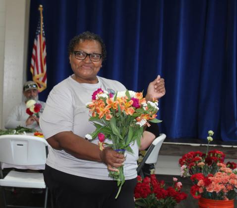 Resident built bouquets at an event held by the City of Fernandina Beach and Colombia Flowers/That Flower Feeling.