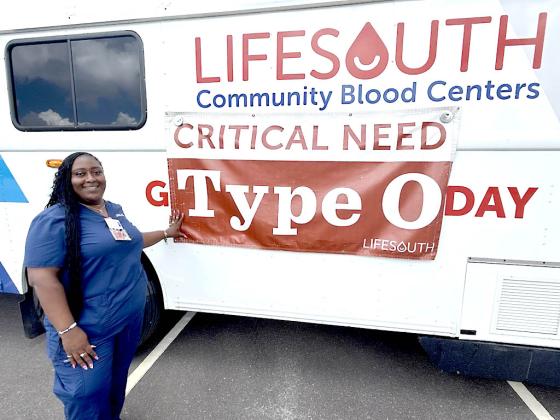 Donor Service Technician Selena Fedd stands outside LifeSouth’s bus in Wildlight on Tuesday. Photo by Nick Blank/News-Leader