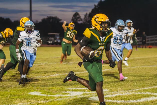 Jayden Timmon carries the ball to the end-zone for the Hornets first touchdown of the game Friday against Ribault. Photo by Ashley Chandler/News-Leader