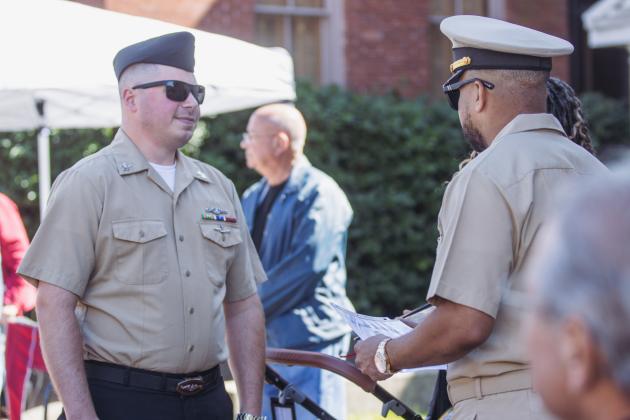 Petty Officer Michael Gregory Payne re-enlists during the 8 Flags Car show on Saturday. Photo by Ashley Chandler/News-Leader