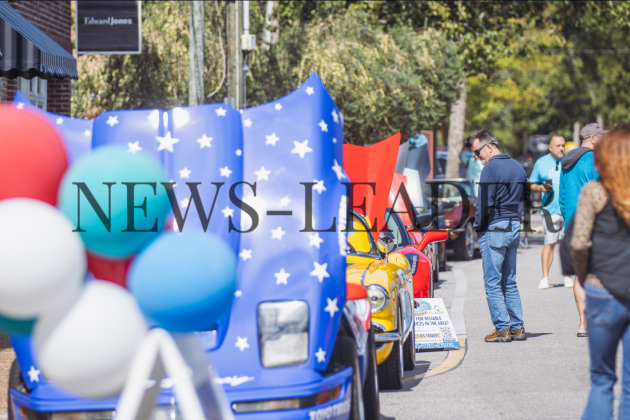 People check out automobiles during the 30th Annual 8-Flags Car Show on Saturday in Downtown Fernandina Beach. Photo by Ashley Chandler/News-Leader