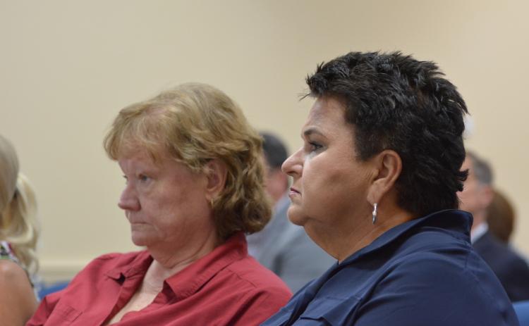 Nassau County School District board chairwoman Donna Martin and superintendent Kathy Burns attend a Nassau County Commissioners meeting in June, where the commissioners voted to add an additional mill to the ballot for voters to decide upon. Photo by Marissa Mahoney.