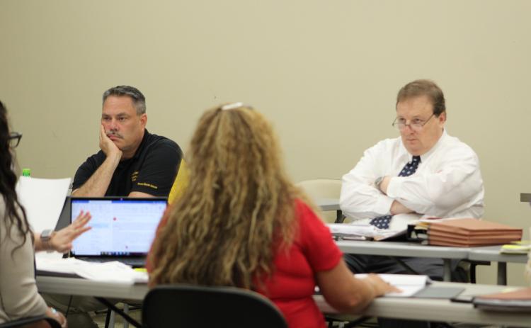 Nassau County School District Director of Facilities Jeffrey Bunch and attorney Damon Kitchens participate in Wednesday's bargaining session with the Nassau Educational Support Personnel Association. Holly Dorman/News-Leader