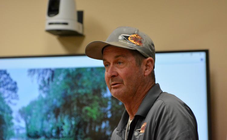 John Ferrell Burkett speaking at a Board of County Commissioners meeting about drainage issues near his property. Photo by Marissa Mahoney/News-Leader.