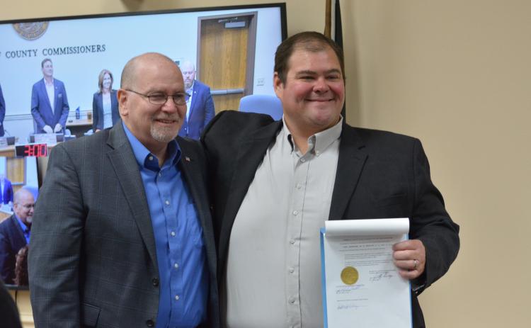 Commissioners Thomas Ford and Aaron Bell accepting resolutions commending their service to Nassau County.  Photos by Marissa Mahoney/News-Leader.
