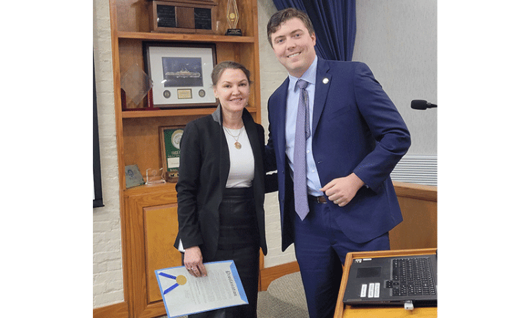 Caroline Best receives recognition from Mayor Bradley Bean before Municipal Clerks Week. In typical fashion, Best thanked city leaders, past and present. “I can’t do my job without your trust in me and my ability,” she said. “I sincerely appreciate the opportunity to serve each of you every single day.” Photo by Julia Roberts/News-Leader
