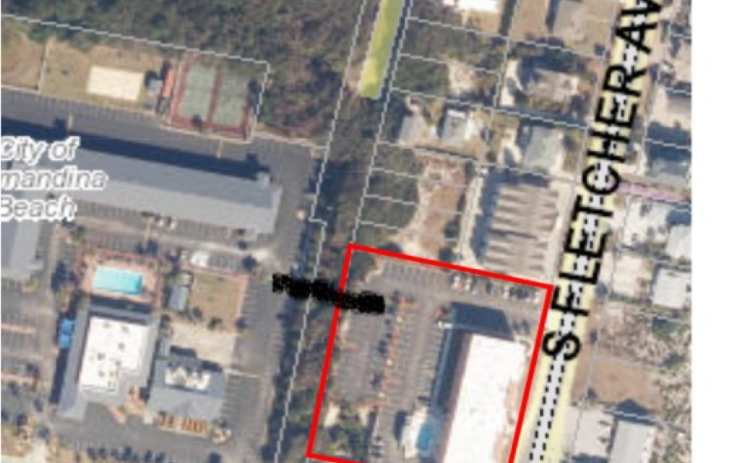 The dark line is where the owners of two hotels on Sadler Road want to build a walkway that would go over a secondary dune that is on the Egans Creek Greenway. The city commission approved a license agreement to build the walkover, but plans will have to be approved by city staff before building permits are issued. Submitted photo