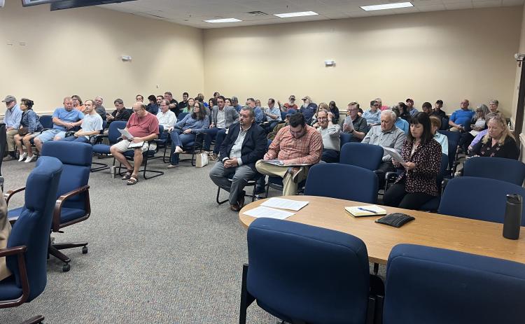 Commission chambers were full ahead of the Nov. 7 Planning and Zoning board meeting to discuss the rezoning of approximately 206 acres of land in the Nassauville area from Open Rural to Residential. Photo by Sean Rosenthal/News-Leader