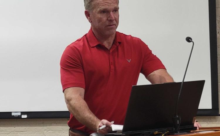 Michael Sharpe addressed the Fernandina Beach City Commission in opposition to plans for a park on the Amelia River waterfront. He said people who operate businesses out of the Fernandina Harbor Marina oppose the plan, as well. Julia Roberts/News-Leader