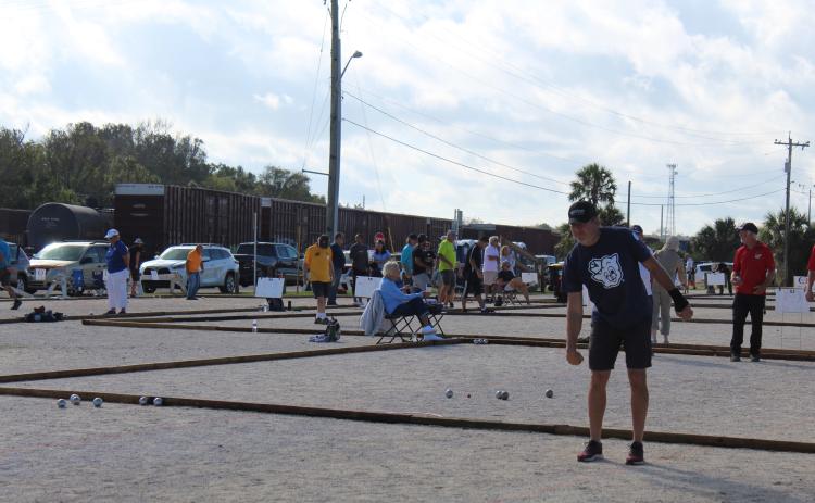 The Amelia Island Boules Club hosts the Petanque Amelia Island Open Tournament, the largest pétanque event in the Americas, each November, bringing hundreds of players from all over the world to Fernandina Beach. Petanque courts on the Amelia River waterfront in Fernandina Beach are under attack, as some residents say they should not be permanent in a riverfront park, and should only be played at the park during the tournament. File photo