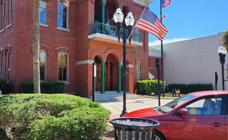 A temporary art installation was once on this pedestal in front of the courthouse on Centre Street. The base now homes a trash can. Nassau Council of Arts and Culture President Richard Restiano worked with the artist to bring the piece to the city. NCAC wants to work with the city on its Arts in Public Places program, which the city is considering placing under the direction of Parks and Recreation. Photo courtesy NCAC