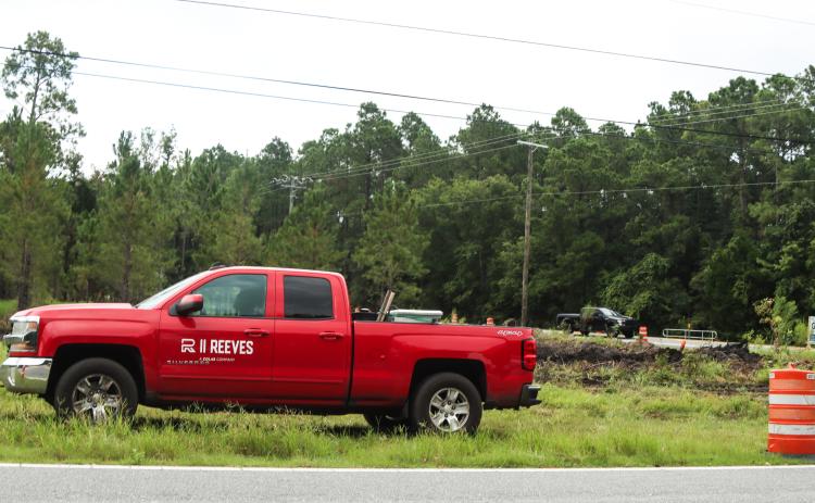 A Reeve's Construction pickup is parked near the Chester Road and Pages Dairy Intersection on a stormy August day. The portion of Chester Road expected to be closed yesterday, has been postponed due to the anticipation of heavy rains this week. The railroad reconstruction is expected to commence Sept. 19 for about five days. Ashley Chandler/News-Leader