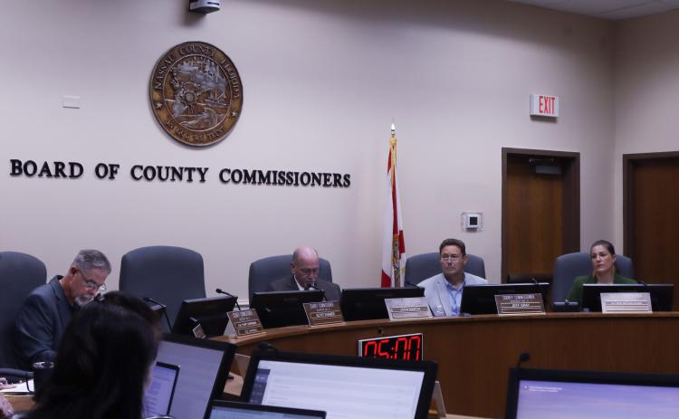 From left, commissioners A.M. "Hupp" Huppmann, John Martin, Jeff Gray and Alyson McCullough meet Wednesday for the Board of County Commissioners meeting in the Commission Chambers. Commissioner Klynt Farmer was absent from votes this week. Ashley Chandler/News-Leader