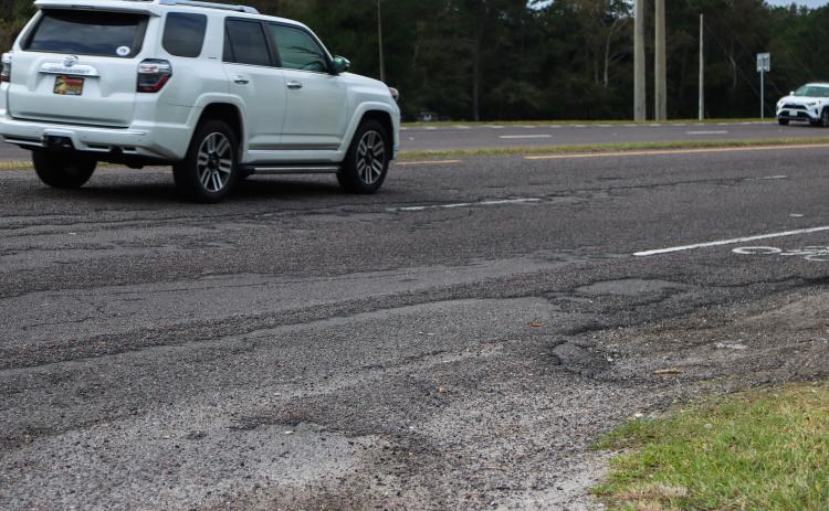 The surface of this stretch of State Road 200 shown is beyond its end of life. The resurfacing project, originally slated for Fall of 2025, is set to begin Monday, with night closures expected. Ashley Chandler/News-Leader