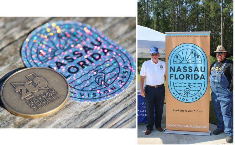 Left: A Nassau County Bicentennial Challenge Coin is shown alongside a Nassau County Vision 2050 sticker. Right: Chairman of the Board of County Commissioners, John Martin, left, poses with Commissioner Klynt Farmer next to a Nassau County Vision 2050 rollup banner at a Vision 2050 popup event in April. Photos by Ashley Chandler/News-Leader