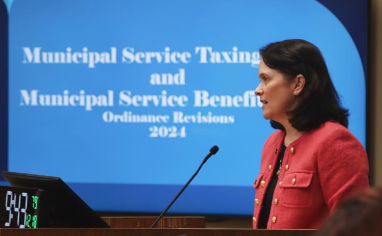 Deputy County Attorney Abigail Jorandby presents to the Board of County Commissioners on Dec. 18. Photo by Ashley Chandler/News-Leader