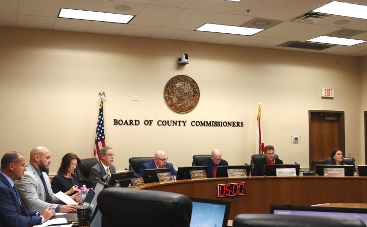 County staff and commissioner meet for the final meeting of 2024. From left, Assistant County Manager Marshall Eyerman, County Manager Taco Pope, County Attorney Denise May, commissioners A.M. "Hupp" Huppmann, Klynt Farmer, John Martin, Jeff Gray and Alyson McCullough. Photo by Ashley Chandler/News-Leader