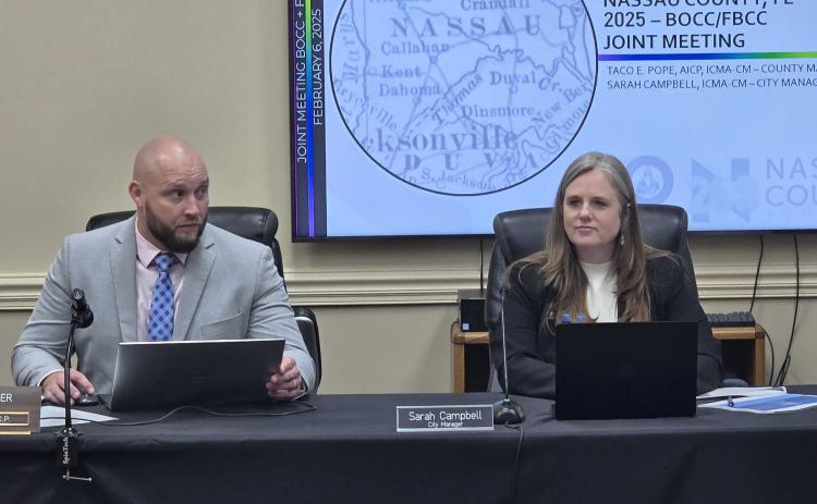 County Manager Taco Pope, left, and City Manager Sarah Campbell at the joint meeting between the Fernandina Beach City Commission and the Nassau County Board of County Commissioners on Thursday at the James S. Page Governmental Complex. Photo by Julia Roberts/News-Leader