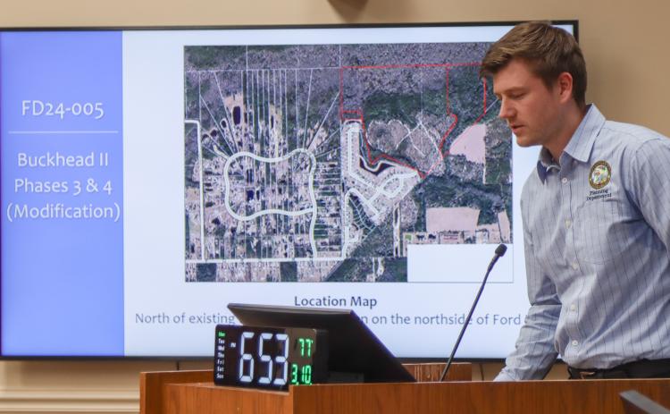 Adam Olsen of the Planning Department gives a staff presentation during the Quasi Judicial Public Hearing on March 10 over the final development plan modifications for Buckhead II Phases 3 and 4 of Buckhead Planned Unit Development. Photo by Ashley Chandler/News-Leader
