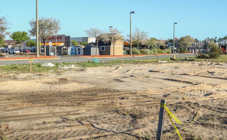 A dirt lot is shown March 11 where Nassau County’s Hwy 55 was supposed to be, located on the edge of the Home Depot Parking lot. Photo by Ashley Chandler/News-Leader