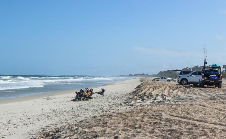 Vehicles parked on American Beach earlier this month. Photo by Ashley Chandler/News-Leader