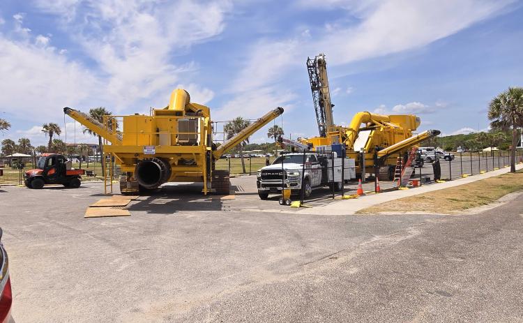 This dredging equipment is being staged in the Dolphin Parking lot at Main Beach. Photo by  Julia Roberts/News-Leader