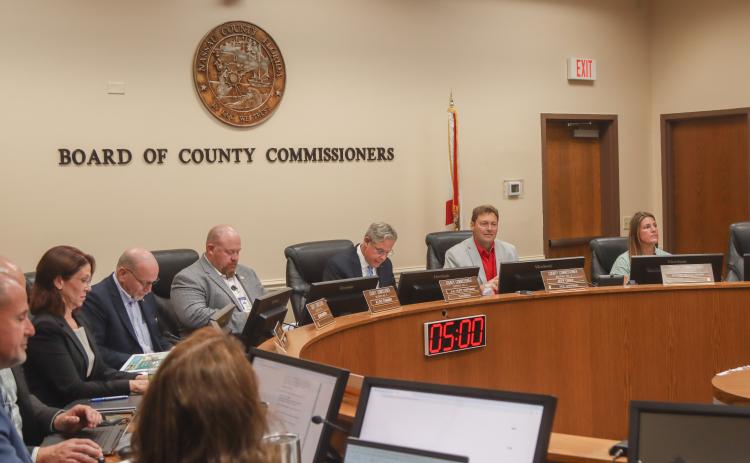 The Board of County Commissioners meets May 12 in the Commission Chambers at the James S. Page Governmental Complex. From left, County Attorney Denise May, commissioners John Martin, Klynt Farmer, A.M. "Hupp" Huppmann, Jeff Gray and Alyson McCullough. Photo by Ashley Chandler/News-Leader