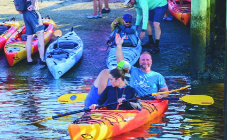 More than 110 paddlers finished a 9-10 mile kayak from St. Marys to Fernandina Beach to benefit veterans over the weekend. (COURTESY)