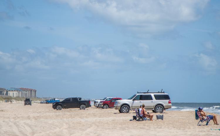 Automobiles are shown at American Beach on May 1. Ashley Chandler/News-Leader