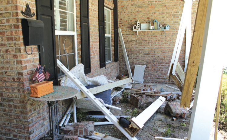 Damage to the Stevensons’ house following the latest accident. Photo by Marisa DeMar/News-Leader