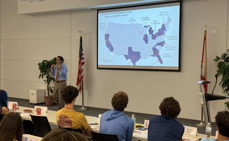 Fifth District Court of Appeal Judge Adrian Soud speaks to students about the founding principles of the U.S. Monday.