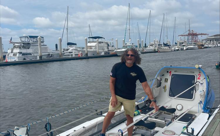 Paul Lore on the row boat in the Fernandina Beach Harbor on Sept 9.  By Marisa DeMar/News-Leader 