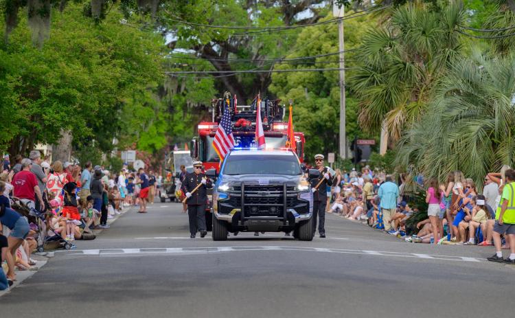 Last year’s Shrimp Fest Parade motors down the road. Photo courtesy Isle of Eight Flags Shrimp Festival’s Facebook page