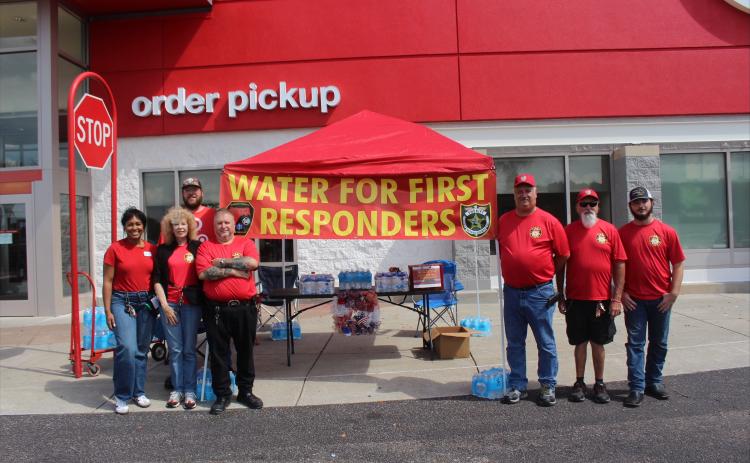 Volunteers from The Community Stewards of Yulee and Target employees collect water for first responders on 9/11 outside of the Yulee store. Those on hand included Judi Turner, Billy Taylor, Ron Blayney, Mathew Barker, and Gene Lovell from The Community Stewards of Yulee joined by Jacob Palmer and Anissa Alvarado from Target. By Marisa DeMar/News-Leader