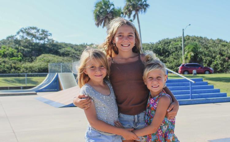 From left, PrimRose (Prim) Waldo, CoralMae (Coco) Waldo, Marigold (Golide) Waldo on Monday at the Poe Pinson Skate Park. Photo by Marisa DeMar/News-Leader