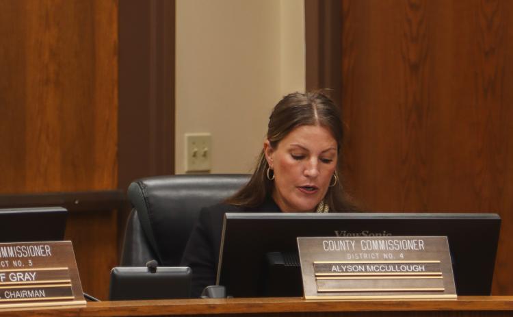 Commissioner Alyson McCullough reads a statement which requests that county staff review guidelines set by The National Animal Care & Control Association. Photo by Ashley Chandler/News-Leader