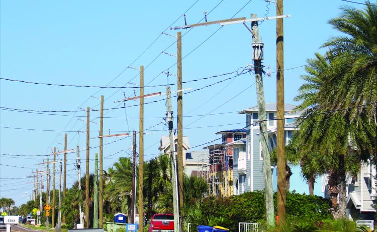 Marisa DeMar/News-Leader Abandoned electrical poles on Fletcher Avenue in Fernandina Beach.