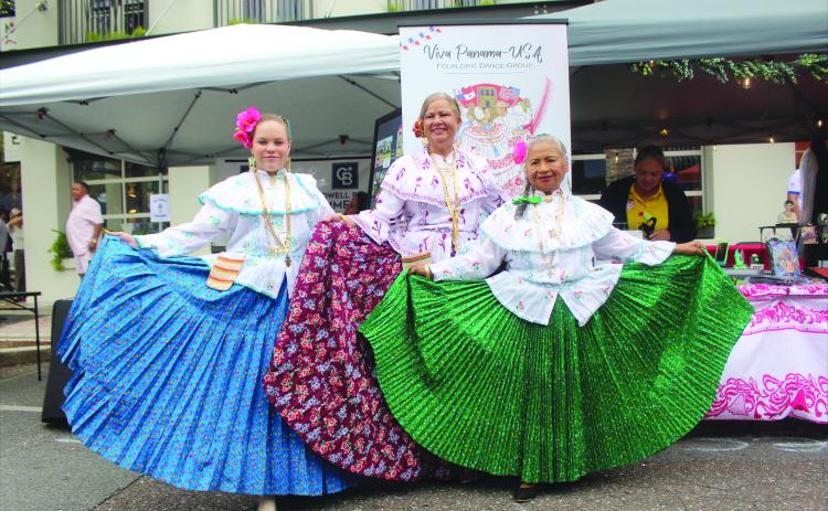 Members of the dance group, Viva Panama USA, showcase traditional Hispanic clothing at the Hispanic Heritage Festival in Fernandina Beach on Saturday. 