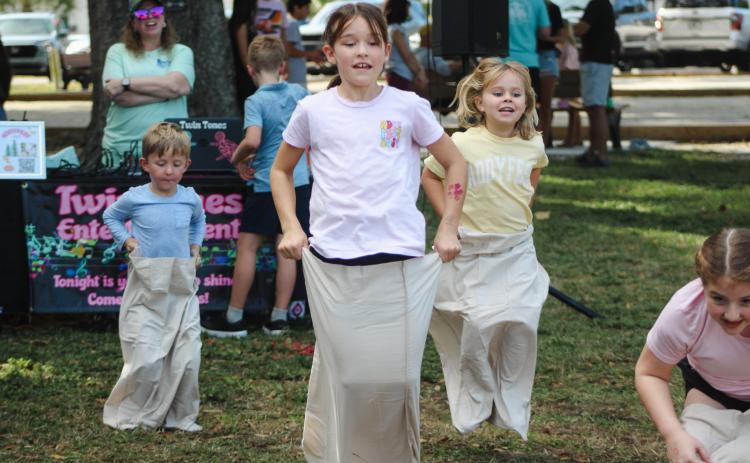 Photos by Marisa DeMar/News-Leader Children take part in Addy Fest on Saturday at Central Park.