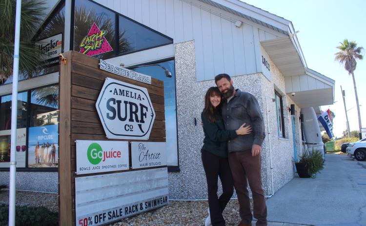 Miranda and Scott Kellogg outside of Amelia Island Surf Co/GoJuice on Wednesday on 1st Avenue. By Marisa DeMar