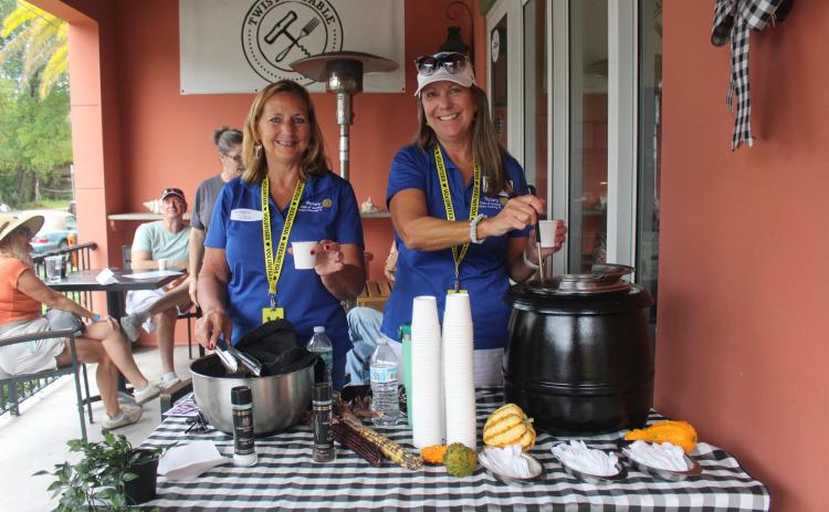 Volunteers from the Fernandina Beach Rotary Club serve homemade tomato soup at Twisted Table during Taste of Amelia on Saturday. Photos by Marisa DeMar/News-Leader 