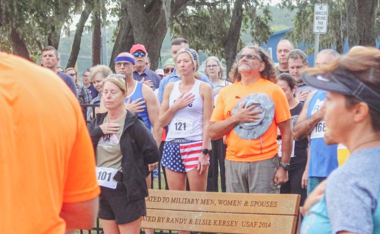 The National Anthem plys ahead of the race hosted by Cross the Line Foundation.