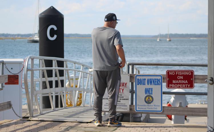 Marisa DeMar/News-Leader  The “Boat Owners Only” sign outside of docks C and D, which restrict access to the working area at Fernandina Harbor Marina on Monday. 