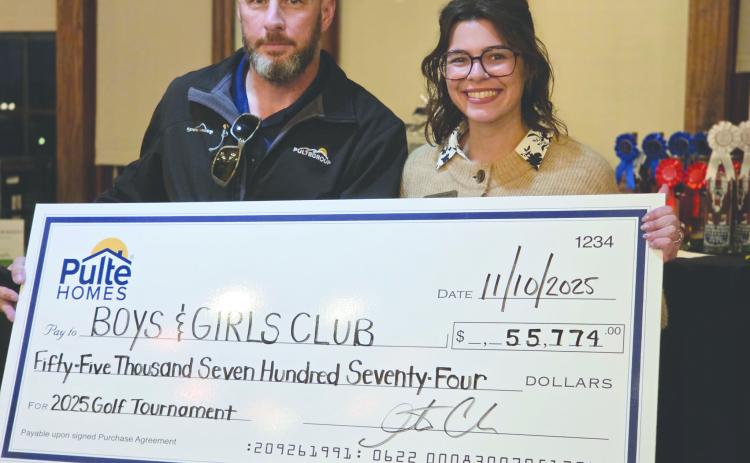 Justin Cook, division president for Pulte and Emily Friedman, director of administration for BGCNCF.