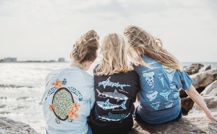 Kids model The Happy Sea merchandise. 